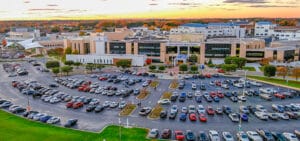 ECU Health Medical Center is seen at sunrise from an aerial view.