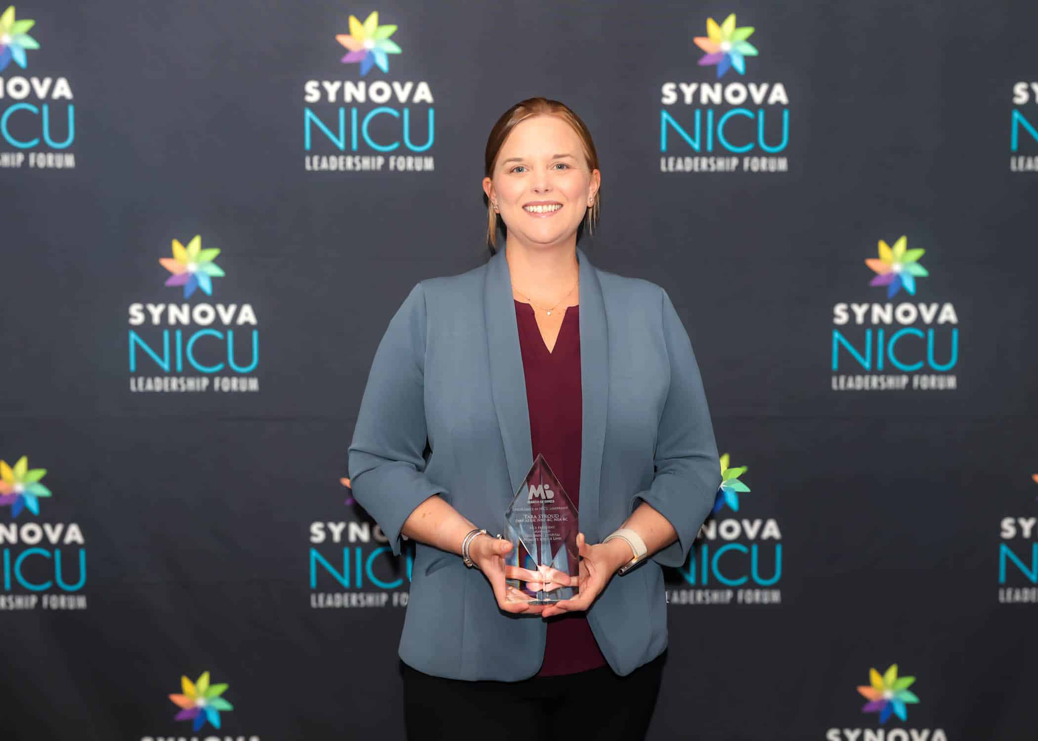Tara Stroud poses for a photo after she was awarded the March of Dimes Excellence in Neonatal Intensive Care Unit (NICU) Leadership Award.
