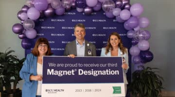 Trish Baise poses for a photo with Jay Briley and Stephanie Seburn during the Magnet Designation celebration.