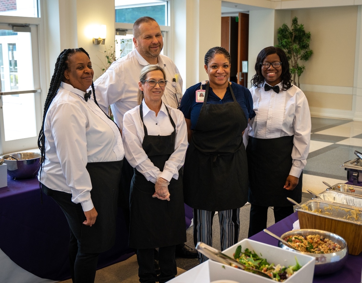 Members of the Food and Nutrition team pose for a photo during a Blue Zone Luncheon at the East Carolina Heart Institute at East Carolina University.