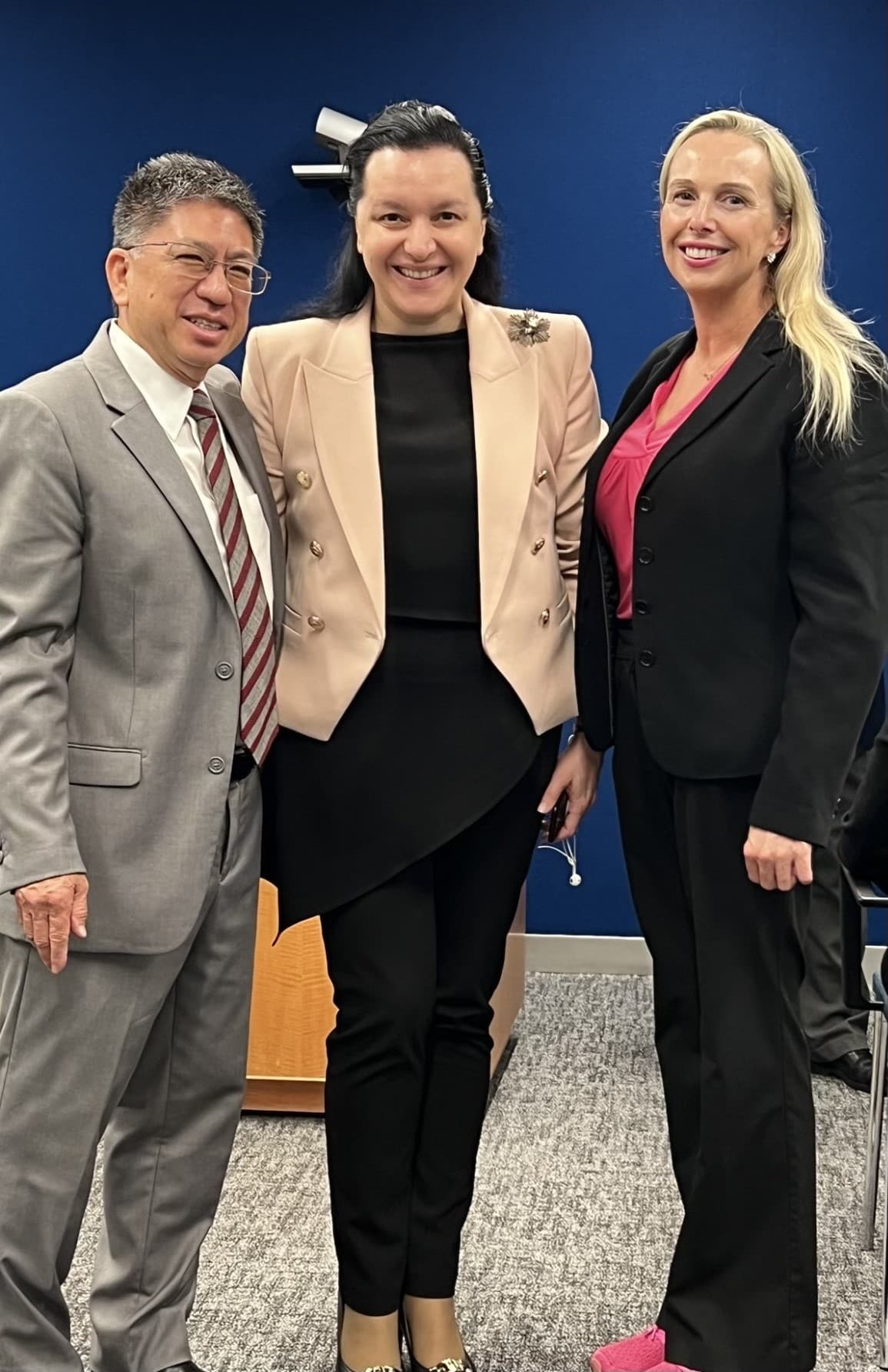 From left, Michael Wong, founder and executive director of the physician-patient alliance for health and safety, Dr. Mariam Jashi, MD, MPH, MPA and the CEO of the Global Sepsis Alliance, and Amy Campbell, quality nurse specialist III at ECU Health, pose for a photo.