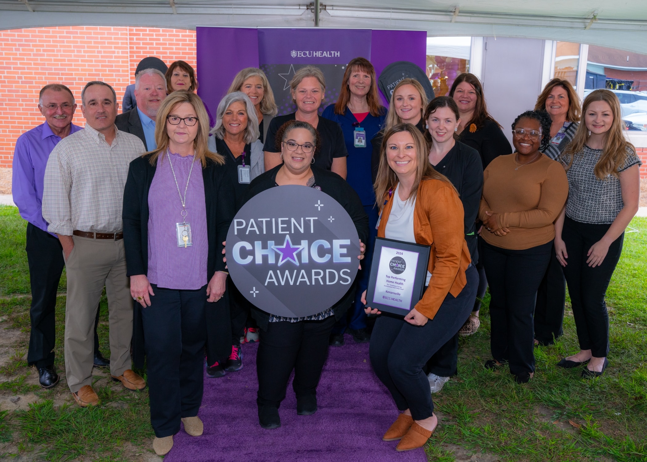 Team members from Home Health and Hospice - Kenansville take a group photo to celebrate winning the Patient Choice Award for ​Top Performing Home Health for Create a Caring Environment to Help Heal.