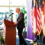 Dr. Michael Waldrum addresses a group at ECU Health Medical Center during a one-year anniversary event for Medicaid expansion in North Carolina.