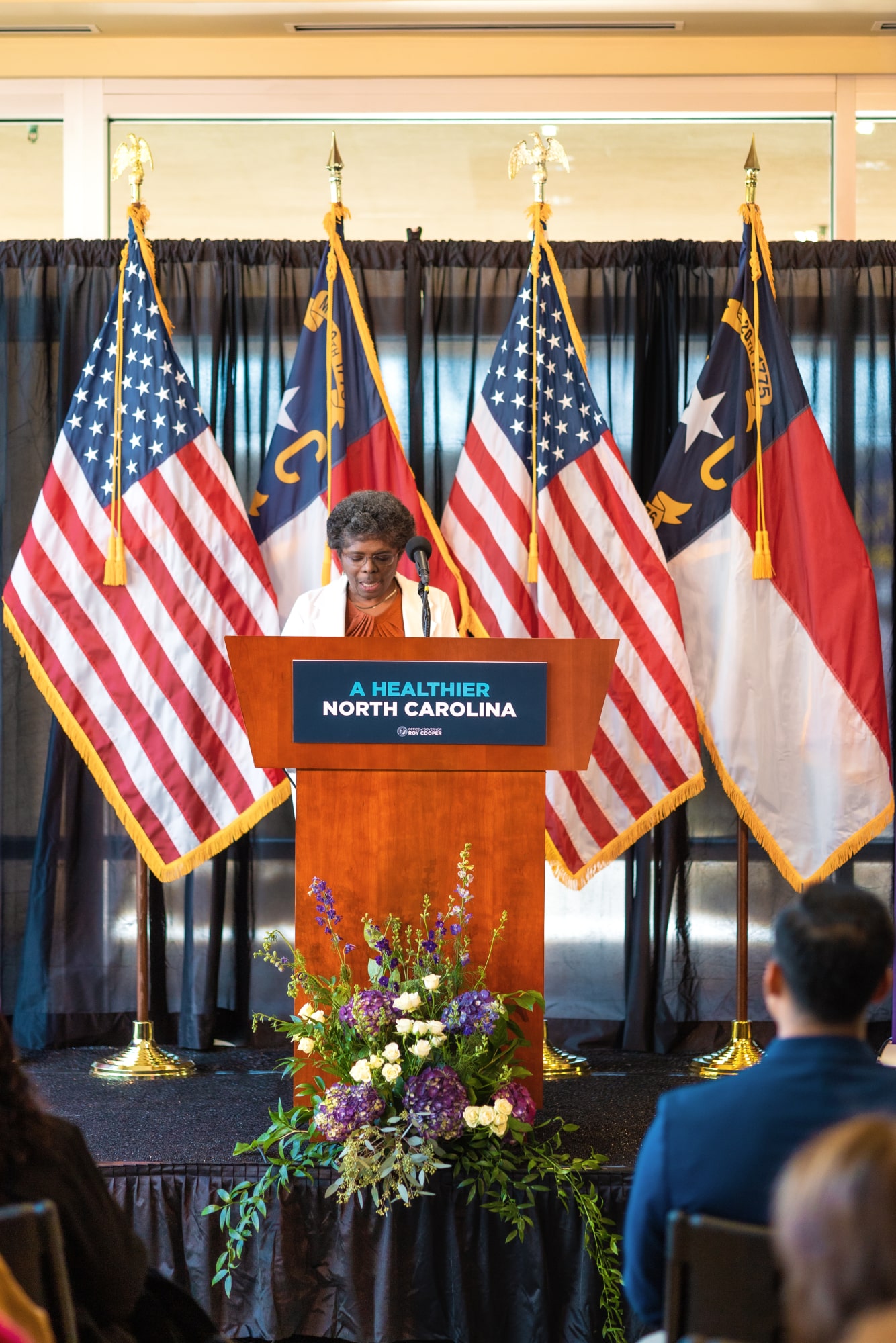 Dr. Karen Coward speaks during an event at ECU Health Medical Center to celebrate one year of Medicaid expansion in North Carolina.