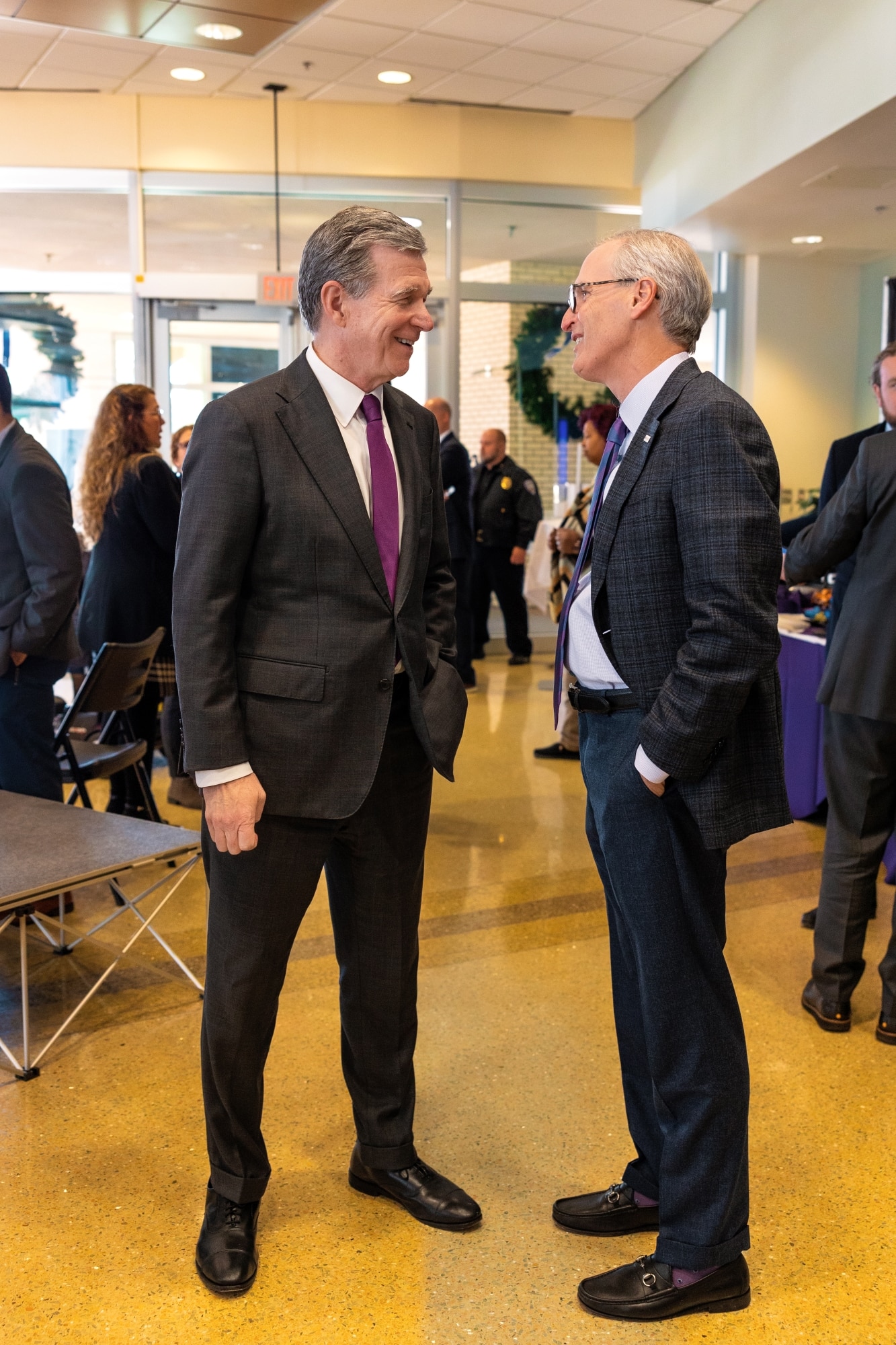 North Carolina Gov. Roy Cooper and ECU Health CEO Dr. Michael Waldrum talk following a one-year anniversary celebration of Medicaid expansion in North Carolina.