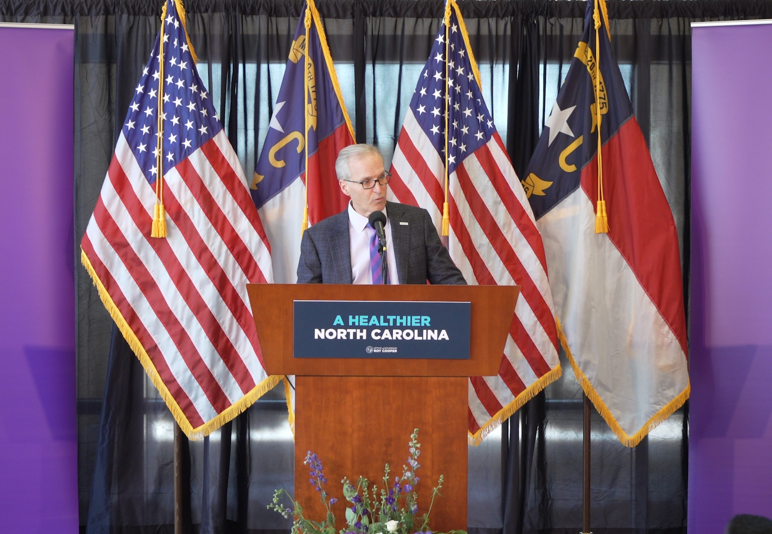 Dr. Michael Waldrum, ECU Health CEO and Dean of Brody, speaks during a one-year anniversary of Medicaid expansion in North Carolina.