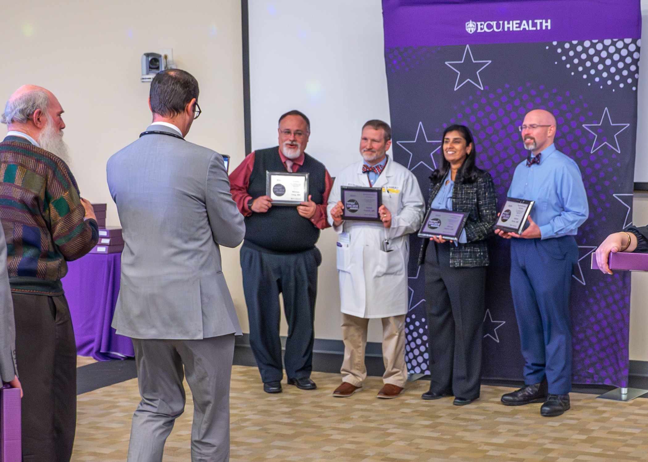 Four Provider Patient Choice Award winners pose for a photo during the awards luncheon.